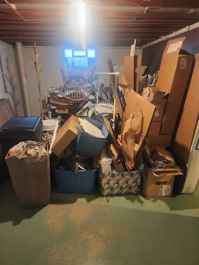 Roll-off dumpster container at job site for 6 Yard Dumpster Rental in Winchester